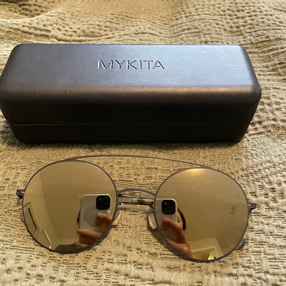 Mykita Aira in Black with black flashes lenses sunglasses